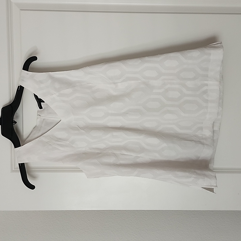 White sleeveless blouse